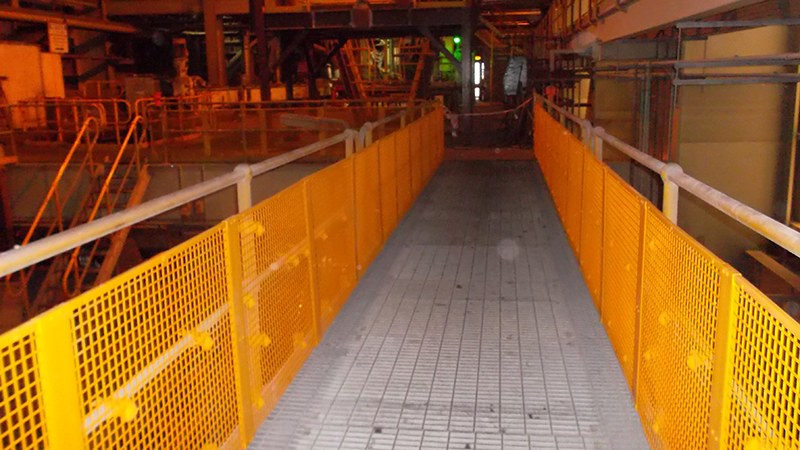 BLH Stop Drop Barricading installed along an industrial walkway
