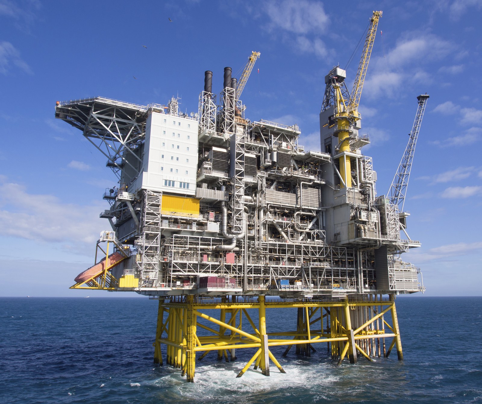 Offshore installation with lifting equipment and steel structures